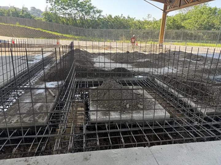 Steel reinforcement cages in the platform foundations before concrete placement.